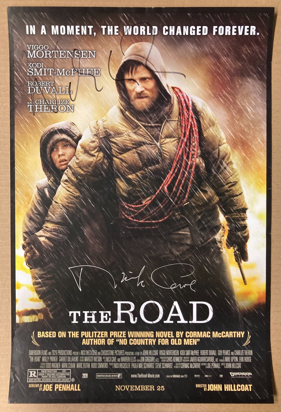 "THE ROAD" MOVIE POSTER SIGNED BY NICK CAVE AND WARREN ELLIS  (13.25"x19.75")