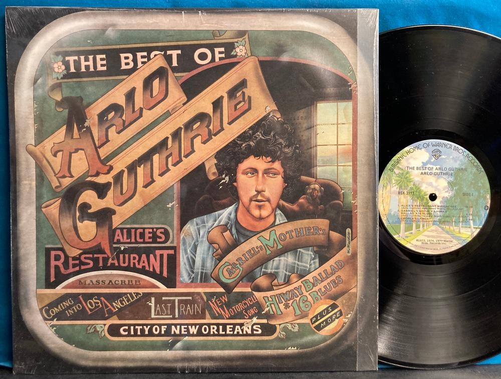 BEST OF ARLO GUTHRIE NM~ORG 1977 LP~SHRINK~ALICES~CITY OF NEW ORLEANS~MOTORCYCLE
