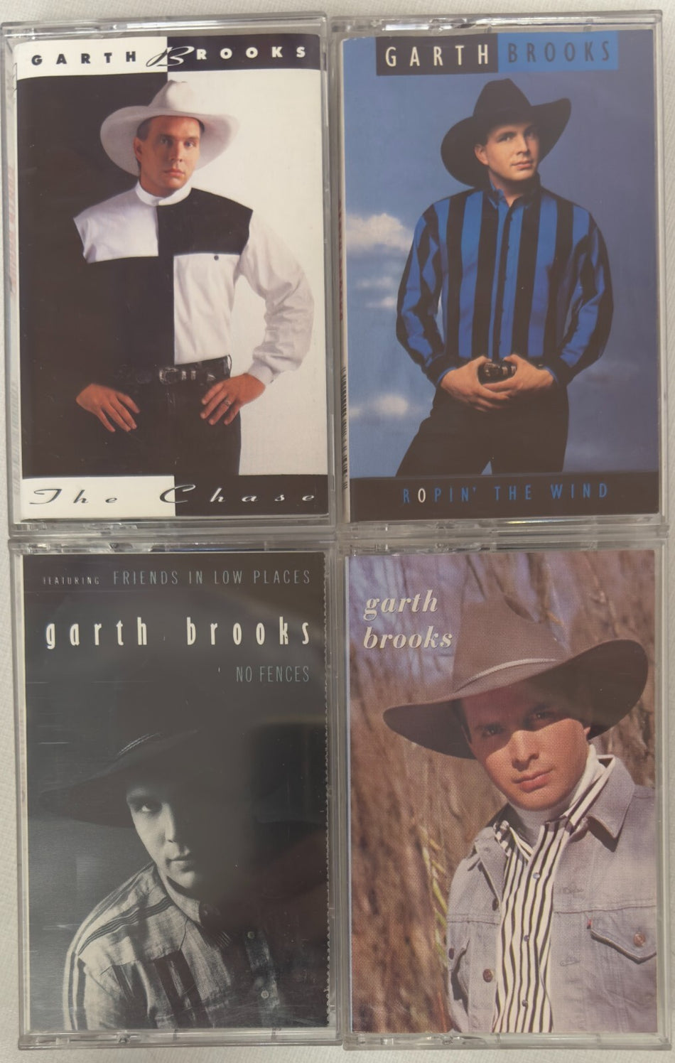 LOT: 4 GARTH BROOKS CASSETTE TAPES~NO FENCES~ROPIN THE WIND~THE CHASE~S/T~EXC
